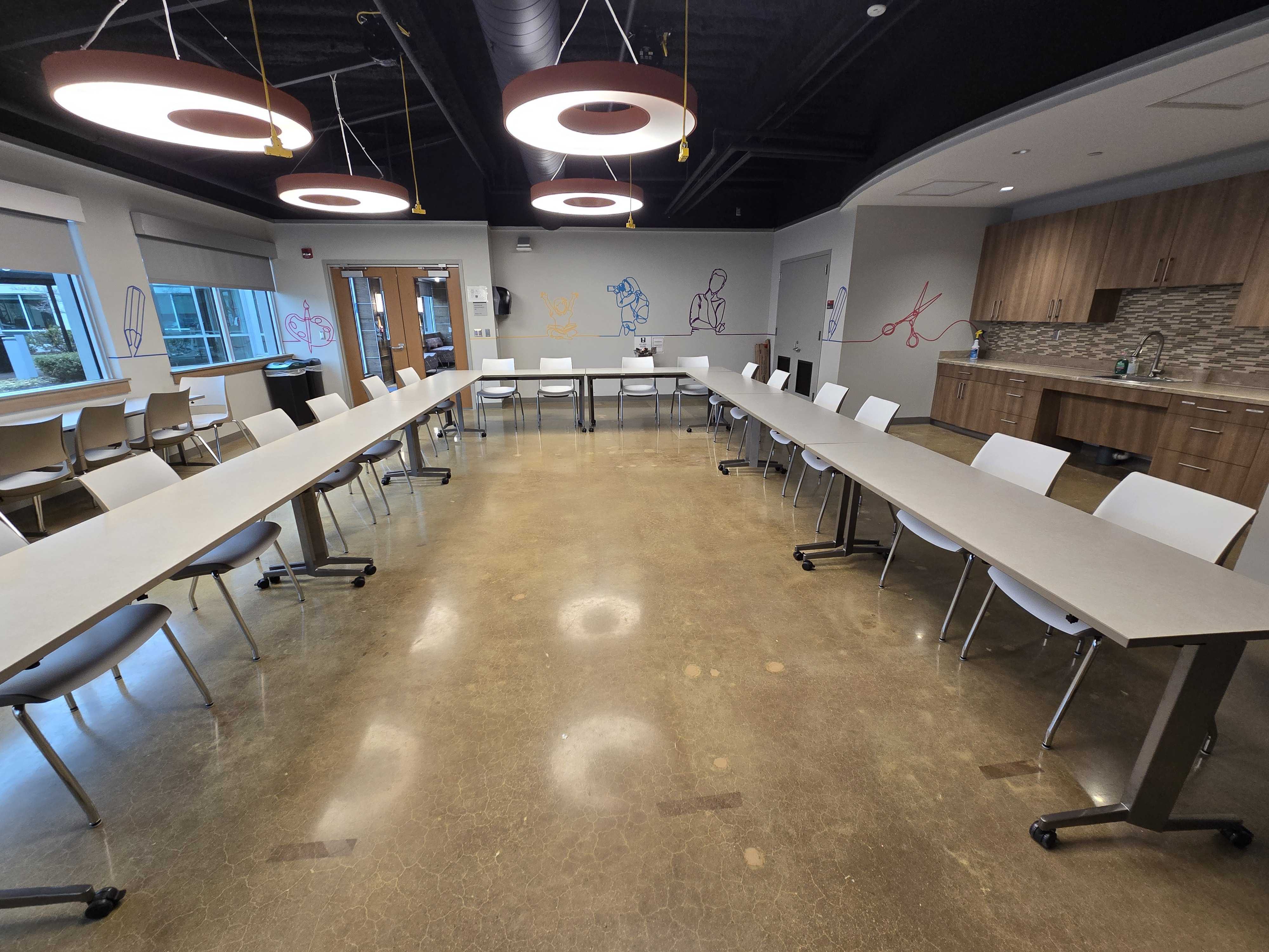 Classroom where tables and chairs are arranged in a U-shape layout