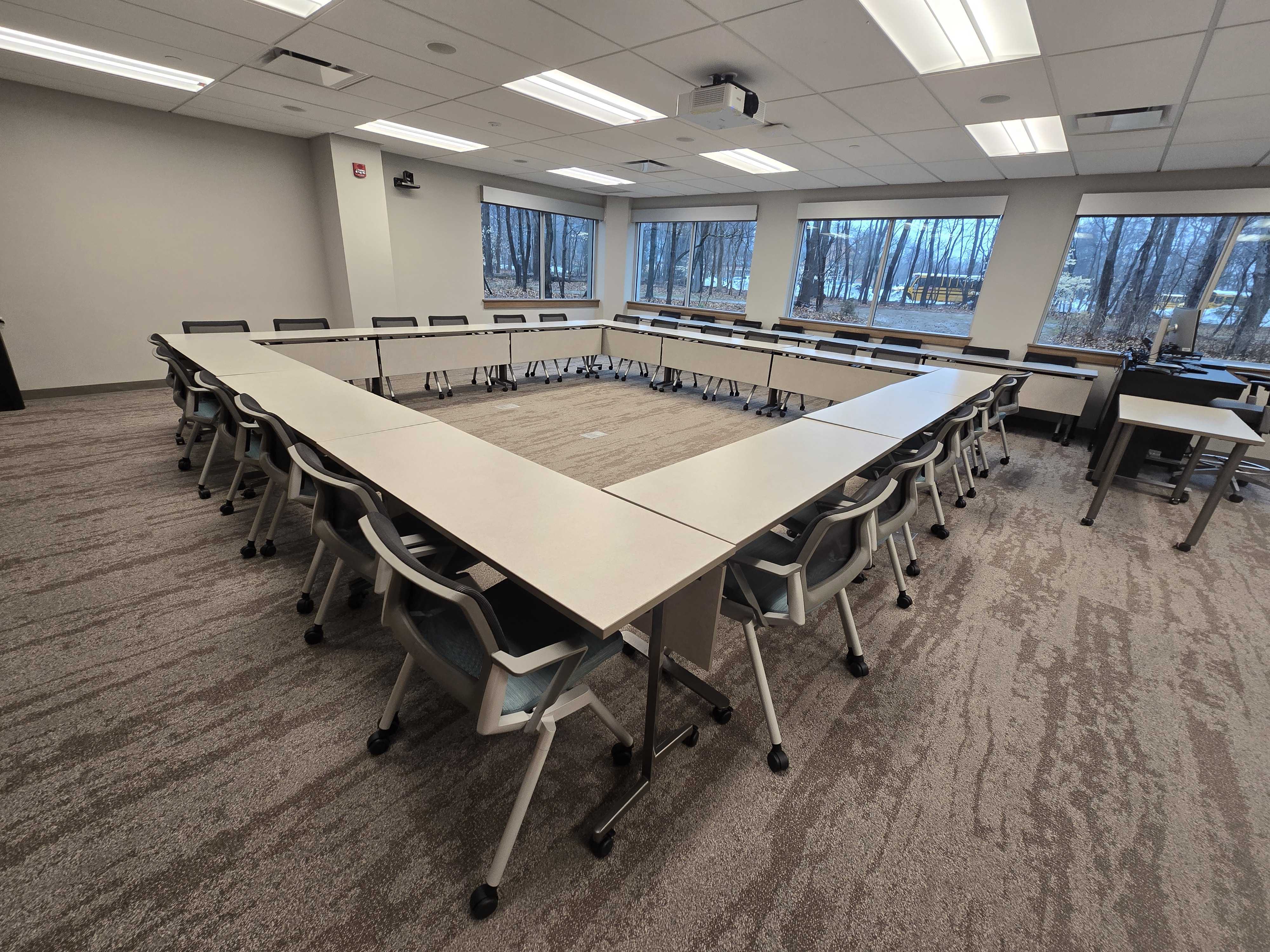 Tables and chairs in a Hollow Square layout