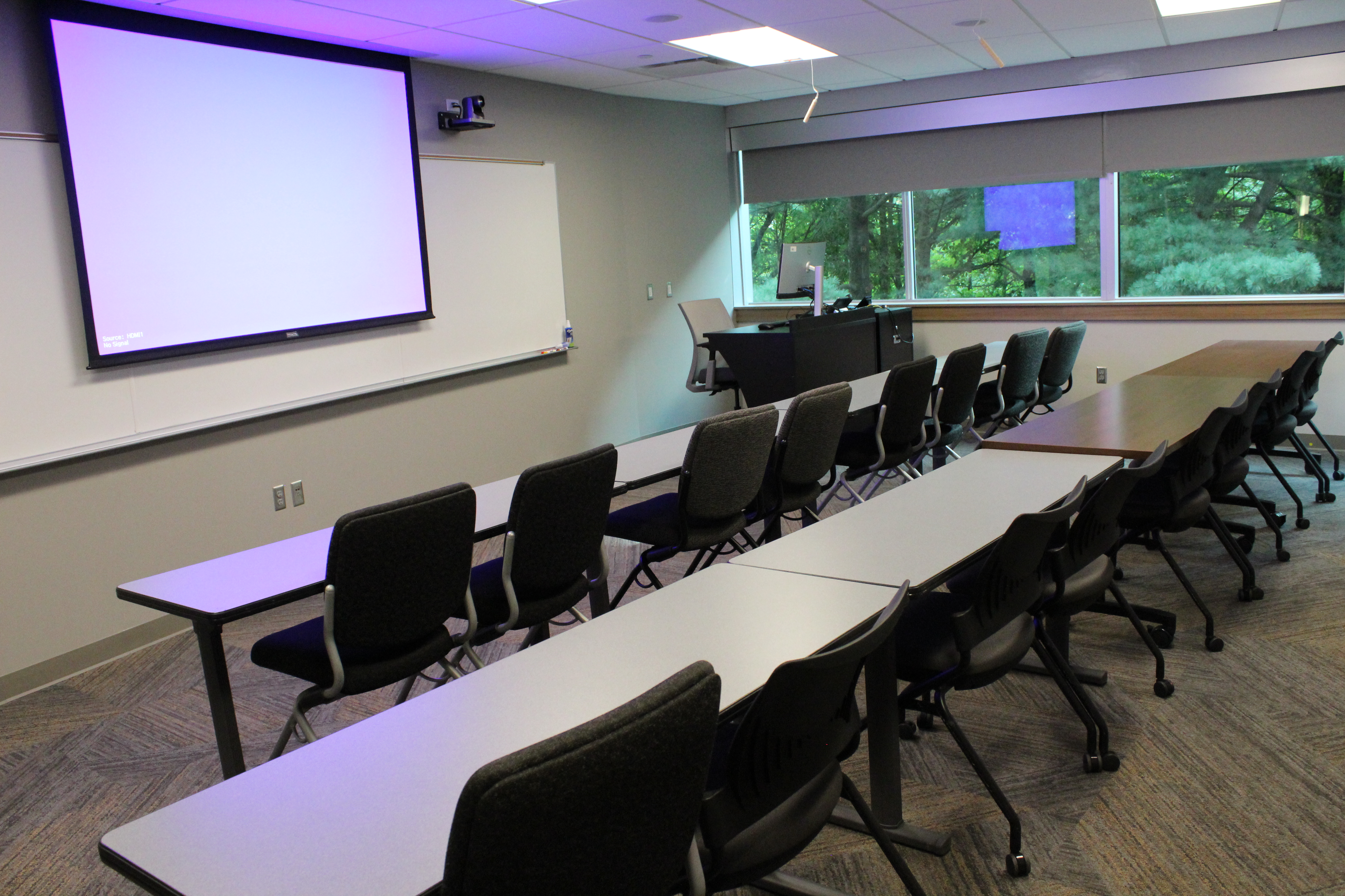 Standard classroom with projector screen in the front center